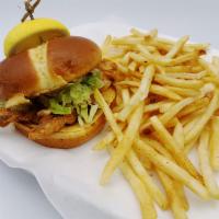 Softshell Crab Sandwich  · Served on a brioche bun with lettuce, tomato and remoulade sauce. Served with fries or subst...