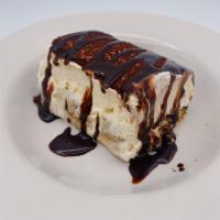 Tiramisu · Lady fingers dipped in coffee layered with a whipped egg, sugar, mascarpone mixture and flav...