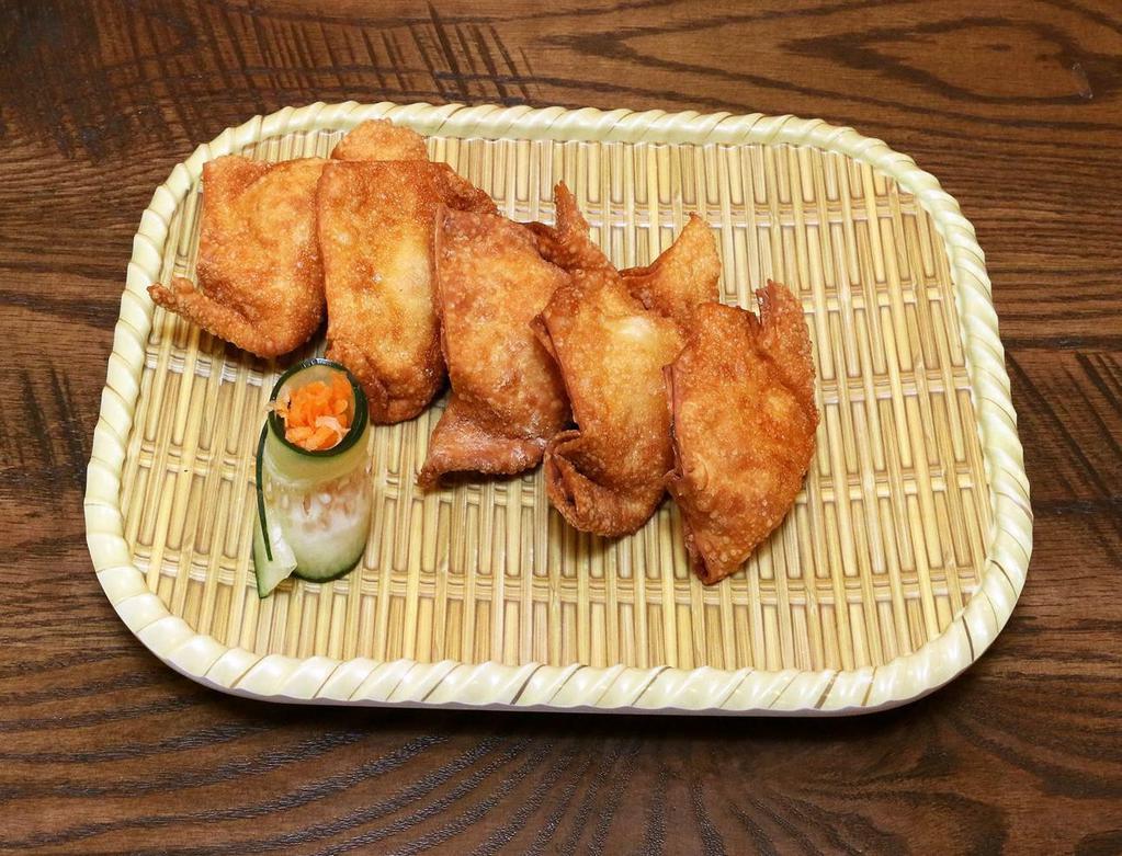 2.  crab Rangoon- Hoanh Thanh Cua · 5 crab Rangoon. Mixture of crab, cream cheese and seasonings wrapped in a wonton. Wrapped and fried crispy. Served with house special sweet and sour sauce.