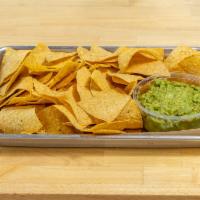 Chips and Guacamole · 8 oz. guac served with our fresh, homemade chips! We fry a fresh batch of chips for every or...