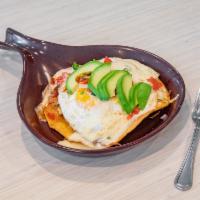 Huevos Rancheros Skillet · Two eggs over easy on fried tortilla, Tyner pond farm chorizo, our spicy Spanish sauce, spic...