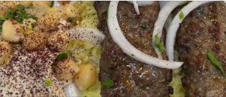 Kifta Plate · Ground Sirloin Beef & Lamb with parsley & onion Served with Rice, Salad, Hummus and Pita bread
