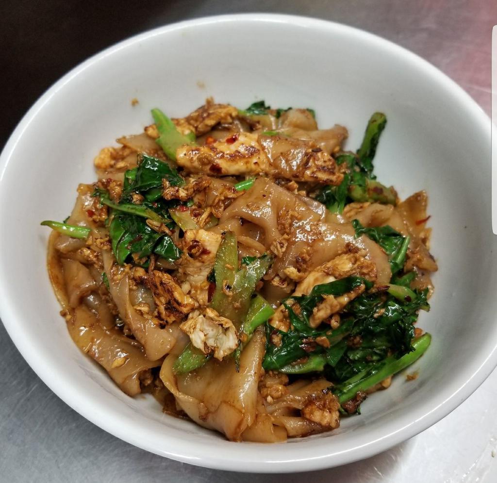 Pad See Ew · Your choice of protein with stir fried flat rice noodle, egg, broccoli and asian broccoli in black soy sauce.