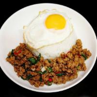 Basil Over rice · Thai street food Minced Pork or Chicken basil over rice with fried egg.  ***Thai spicy***