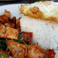 Crispy Pork Belly Basil Over rice · Thai street food Crispy Pork Belly basil over rice with fried egg.  ***Thai spicy***