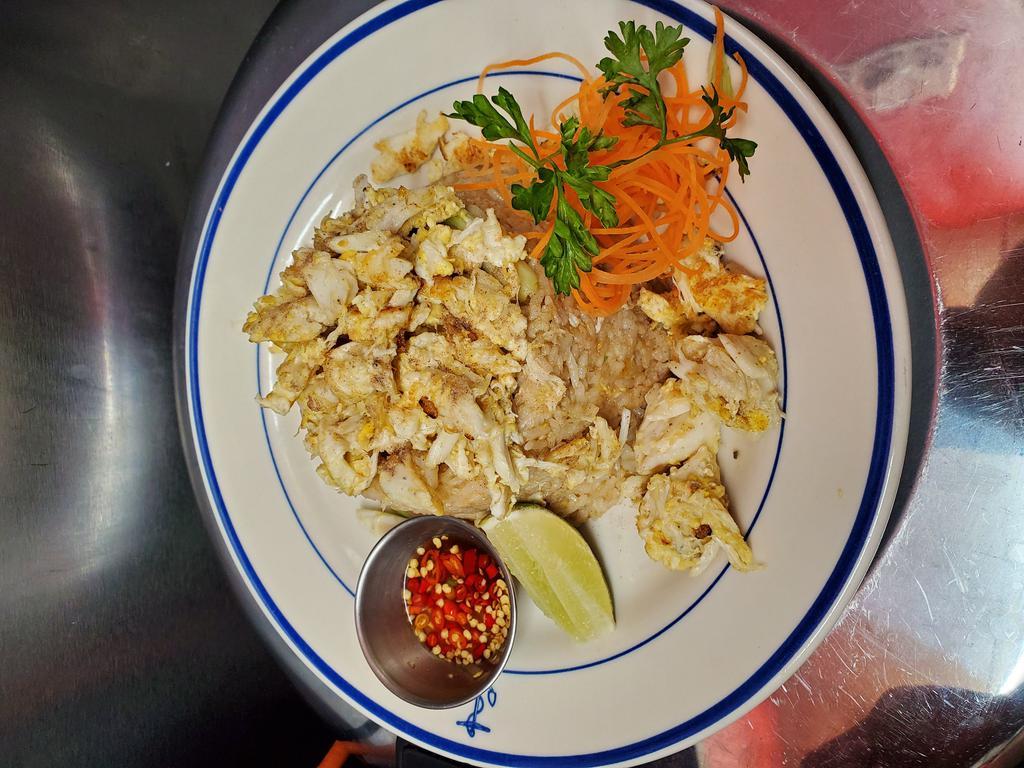 Crab Meat Fried Rice · Crab meat, scallion and egg stir-fried with rice.