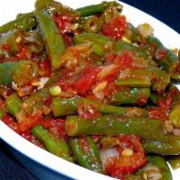 Green Bean Salad · Green beans stewed with tomatoes, onions and garlic. Served with chilled. Vegetarian. Gluten...