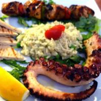 Land and Sea · Your choice of Adana shish kebab, Izmir-style lamb shish kebab, Sirloin shish kebab or chick...