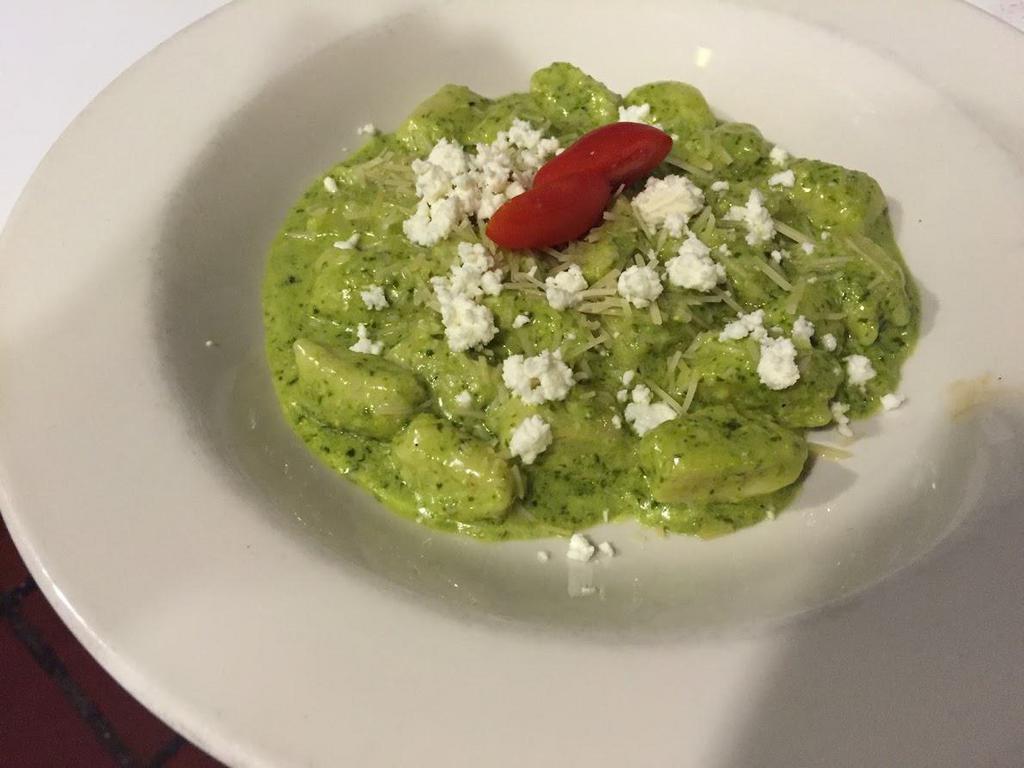 Gnocchi Pesto  · Homemade soft potato dumplings tossed with pesto sauce and topped with feta and Parmigiano cheeses. Add chicken cuts, 3. VG
