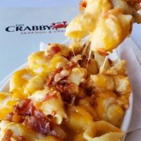 Crab Mac n Cheese · Our homemade mac n cheese baked with king crab lump meat and topped with crispy bacon.