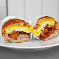 Islander Breakfast Croissant · Ham, Sausage and Bacon, with Egg and Cheese.