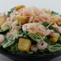 Shrimp Caesar Salad · Baby shrimp served atop Caesar salad with croutons, cheese and Caesar dressing.