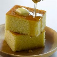 Corn Bread · 2 pieces served with butter and honey.