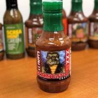 Bottle of JT Pappy's Termigator · The hottest of the gator sauces!