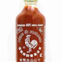 Bottle of Huy Fong Sriracha Garlic · 