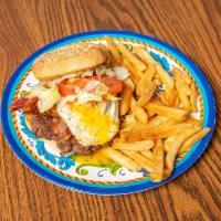 Black Sheep Burger  · A cheddar bacon burger served with a fried egg on top.
