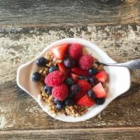 Yogurt and Granola · Yogurt served with house-made granola. Add berries for an additional charge.