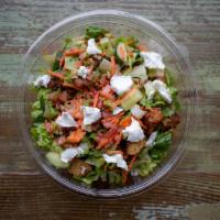 Chopped Farm Table Salad · Chopped Romaine, vegetables, grape tomatoes, walnuts, First Light Farms goat cheese, and cro...
