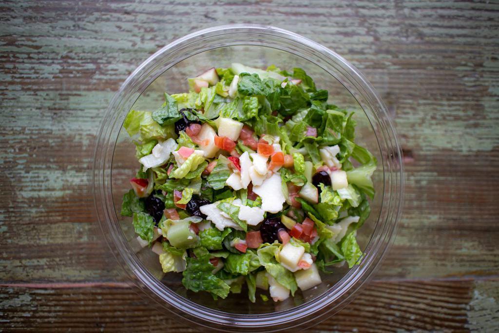 Chopped Harvest Salad · Chopped Romaine, apples, cheddar cheese, dried cherries, and grape tomatoes tossed with a lemon vinaigrette.