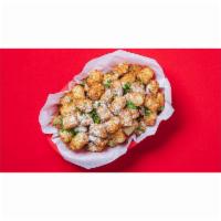 Garlic Parm Tots (Tray) · Party tray of our grated potato puffs tossed in our signature Garlic Parm dry rub! 2,240-2,5...