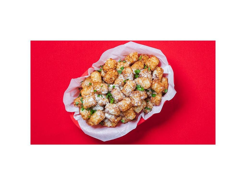 Garlic Parm Tots (Tray) · Party tray of our grated potato puffs tossed in our signature Garlic Parm dry rub! 2,240-2,560 cal.