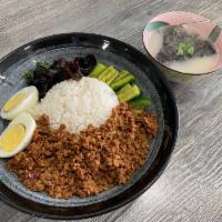 CC15. Braised Ground Pork over Rice 滷肉飯 · Steam rice w/braised ground pork, egg, woodear mushroom, smashed cucumber And a bowl of broth.