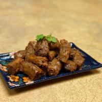 Duck Neck 包装鸭脖 (1lb) · THIS IS NOT A DISH. Packaged and vacuum sealed 1lb of duck necks in mala braised sauce. Read...