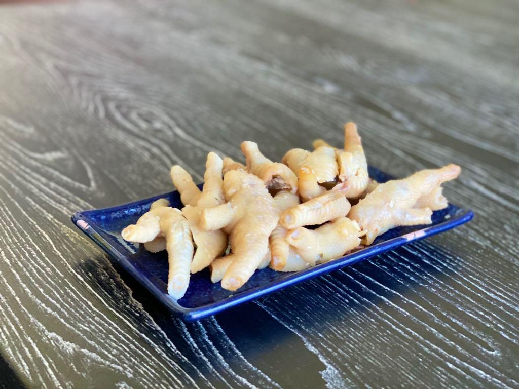 Chicken Feet (plain, not mala) 包装鸡爪 (0.5lb) · THIS IS NOT A DISH. Packaged and vacuum sealed plain chicken feet. Ready to eat. No cooking required. Please consume before sticker date