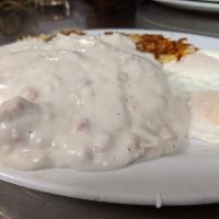 Biscuits & Sausage Gravy · Our own sausage gravy served over 2 biscuits with 2 eggs.