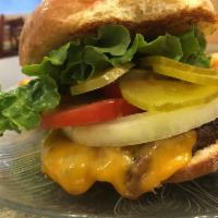 Traditional Cheeseburger · Jack, cheddar or Swiss cheese. Add bacon for an additional charge.