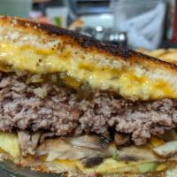 Southwest Burger · Green chili sauce, cheddar cheese on grilled sourdough.