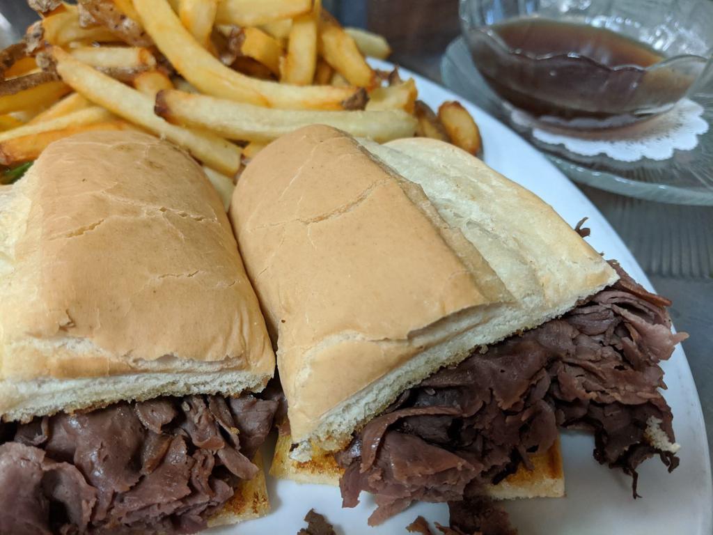 French Dip Sandwich · Roast beef served on hoagie roll with au jus.