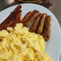 Kansas City Scramble · 4 bacon strips, 4 sausage links, 3 eggs scrambled.