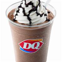 Frozen Hot Chocolate · Rich cocoa fudge blended with our world-famous soft serve and garnished with whipped topping.