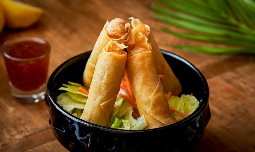 Garden Spring Roll · 5 pieces. Crispy roll stuffed with vermicelli, taro, cabbage, and carrot with sweet chili sauce.
