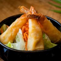 Autumn Shrimp Roll · 5 pieces. Shrimp roll stuffed with chicken wrapped in spring roll, with sweet chili sauce.