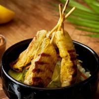 Thai Satay · 5 skewers. Thai famous chicken marinated on skewers served with peanut sauce.