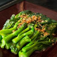 Garlic Chinese Broccoli · Sauteed Chinese broccoli with oyster sauce topped with fried garlic.