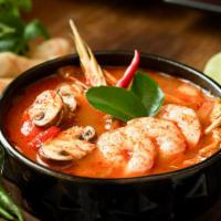 Tom Yum Soup · Choice of shrimp, chicken or tofu with mushroom, lime leaf in spicy, and sour lemongrass bro...