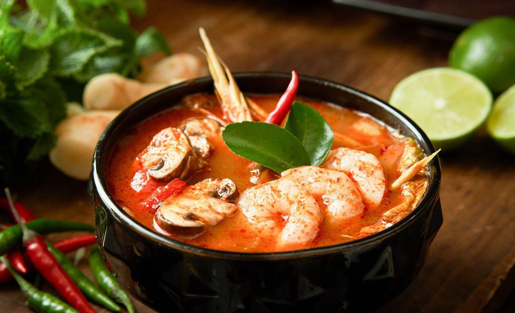 Tom Yum Soup · Choice of shrimp, chicken or tofu with mushroom, lime leaf in spicy, and sour lemongrass broth.
