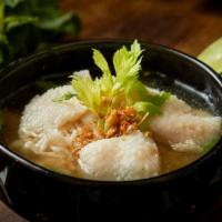 Rice Ginger Soup · Boiled rice, minced chicken or pork with celery, scallion, garlic, and ginger in clear broth.