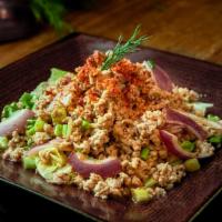 Labb Salad · Served hot and spicy. Minced chicken or pork, red onion, lime juice, mint, chopped scallion ...