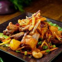Duck Salad · Served hot and spicy. Roasted duck (strip) marinated pineapple, mango, cashew nut, scallion,...