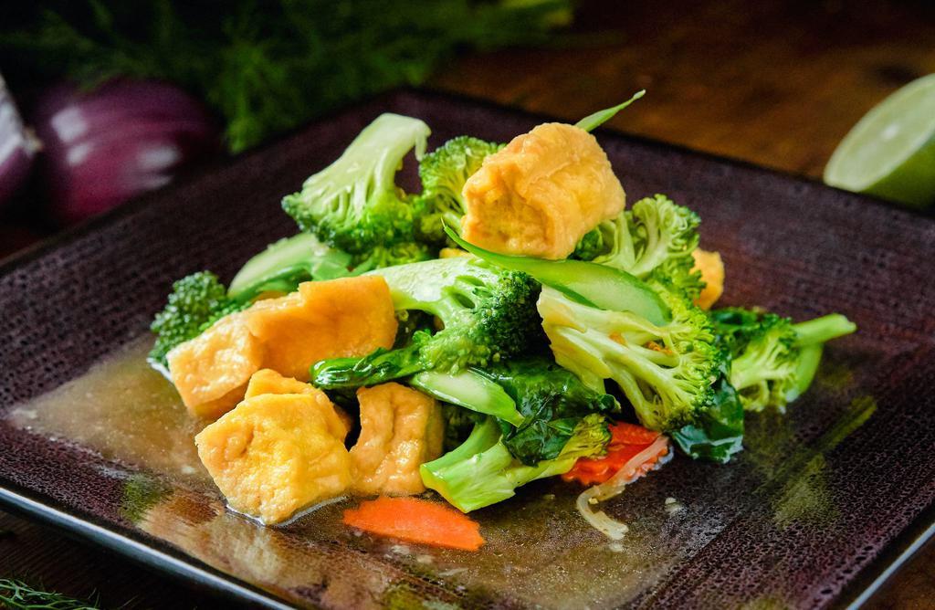 Pad Broccoli · Broccoli, carrot, and Chinese broccoli in garlic sauce. Served with white rice.
