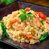 Bangkok Fried Rice · Thai style fried rice with tomatoes, onion, carrot, Chinese broccoli, and egg.