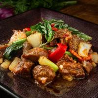 Mock Duck Basil · Served hot and spicy. Crispy mock duck sauteed with hot pepper and onion in chili basil sauce.