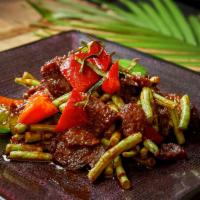 Mock Duck Red String Bean · Served hot and spicy. Crispy mock duck sauteed with string bean, hot pepper, and lime leaves...