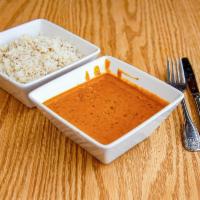 Dal Makhni · A variety of lentils, slow simmered and sauteed with fresh garlic, ginger, tomato, fresh her...