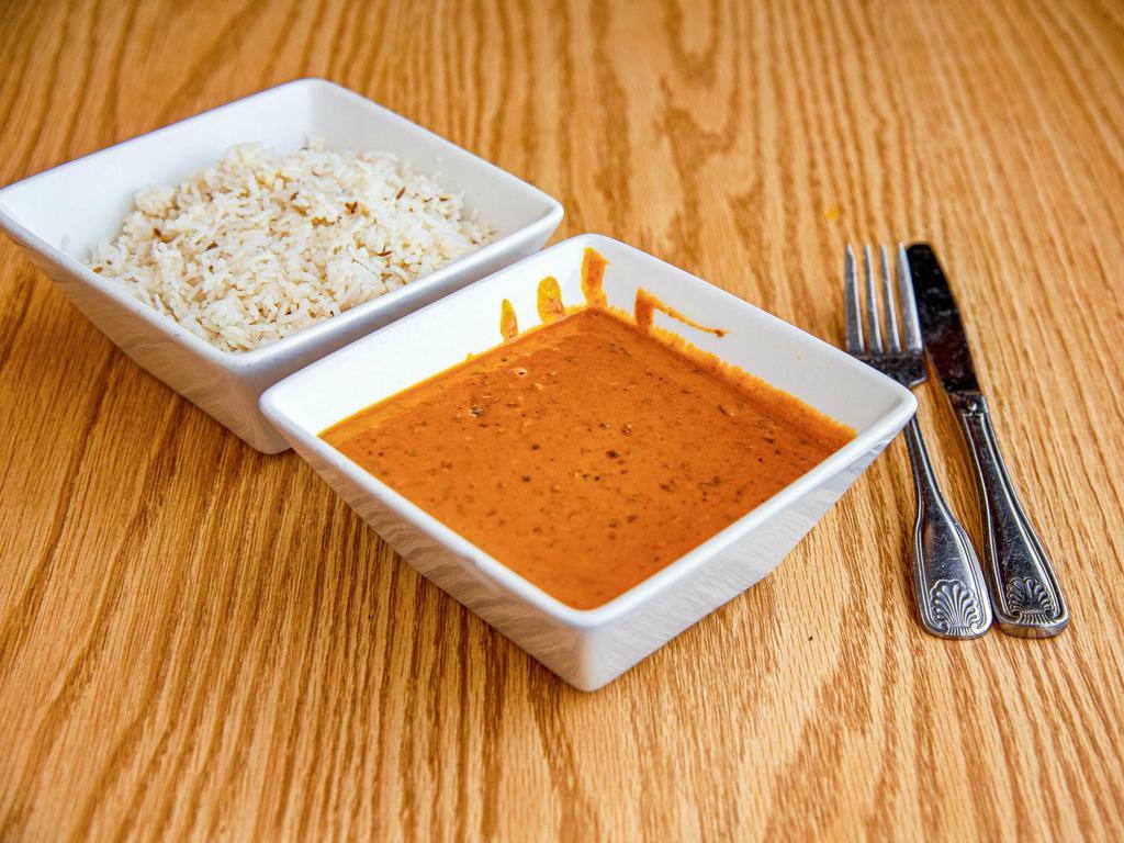 Dal Makhni · A variety of lentils, slow simmered and sauteed with fresh garlic, ginger, tomato, fresh herbs and spices. Vegetarian.