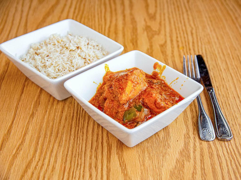 Chicken krahi · Boneless chicken cooked with sliced onions greend peppers , fresh ginger garlic and spices.